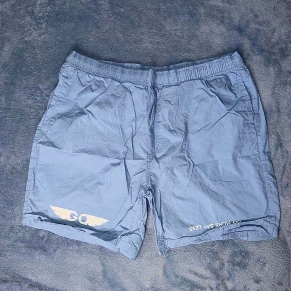 Blue GO Athletics shorts with white wing logo men size 38